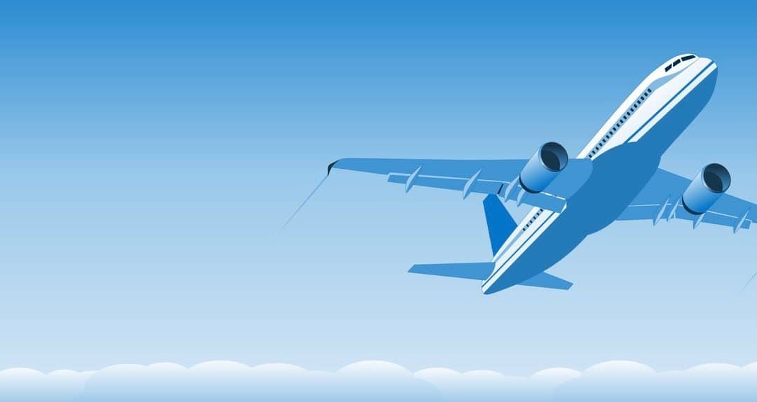 Commercial jet airplane ascending with blue background